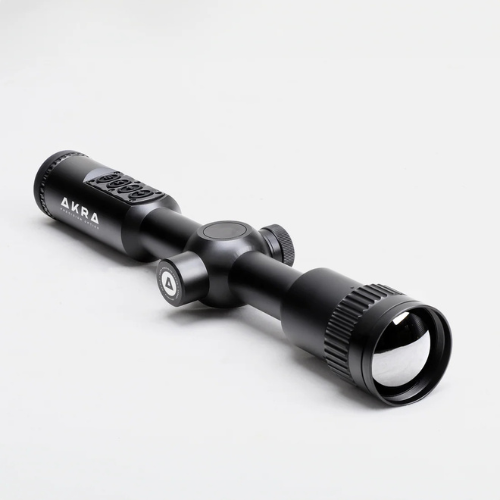 Front isometric view of the AKRA VISION X 3–9x35mm thermal riflescope showing the objective lens, top keypad controls, and body tube.