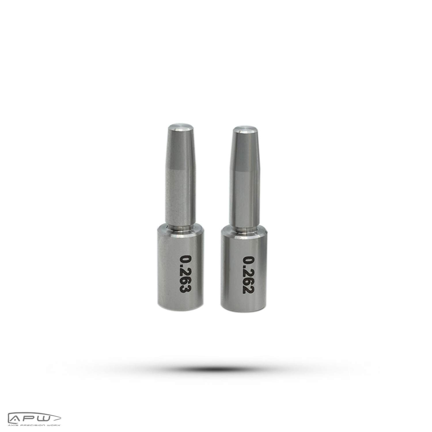 Pair of APW precision expander mandrels standing upright showing engraved caliber sizes 0.263 and 0.262 on a white background