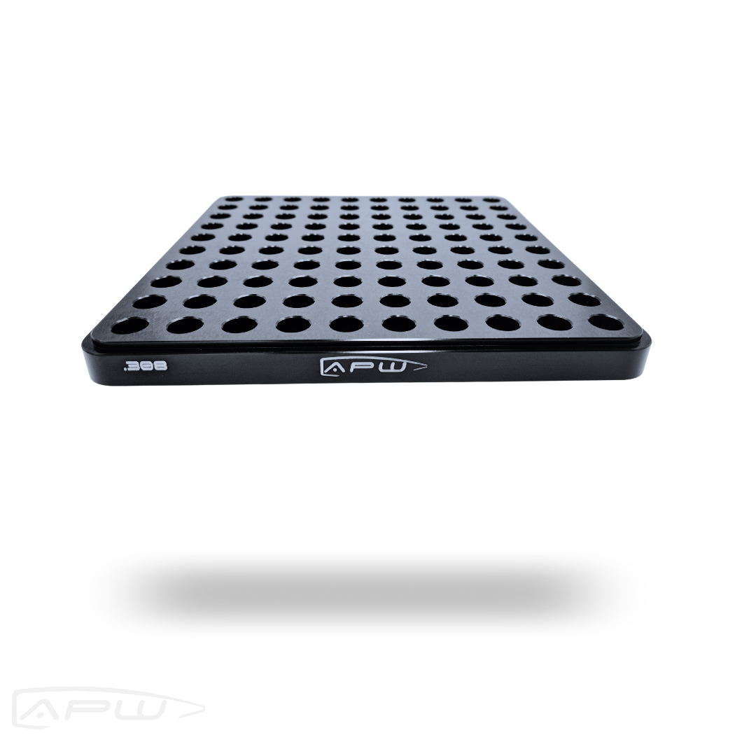Black anodized Axis Precision Worx 100-slot stackable reloading block for .308 Winchester
