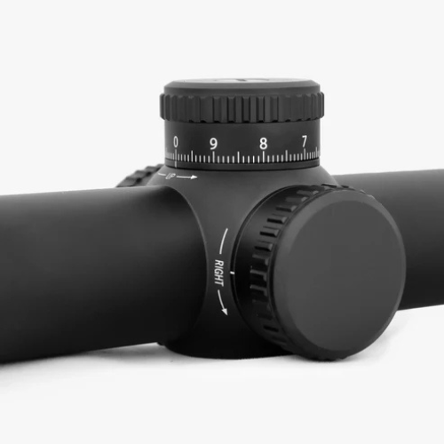 Close-up view of the AKRA GENESIS 3-21x50 FFP low-profile zero stop elevation turret and capped windage knob.