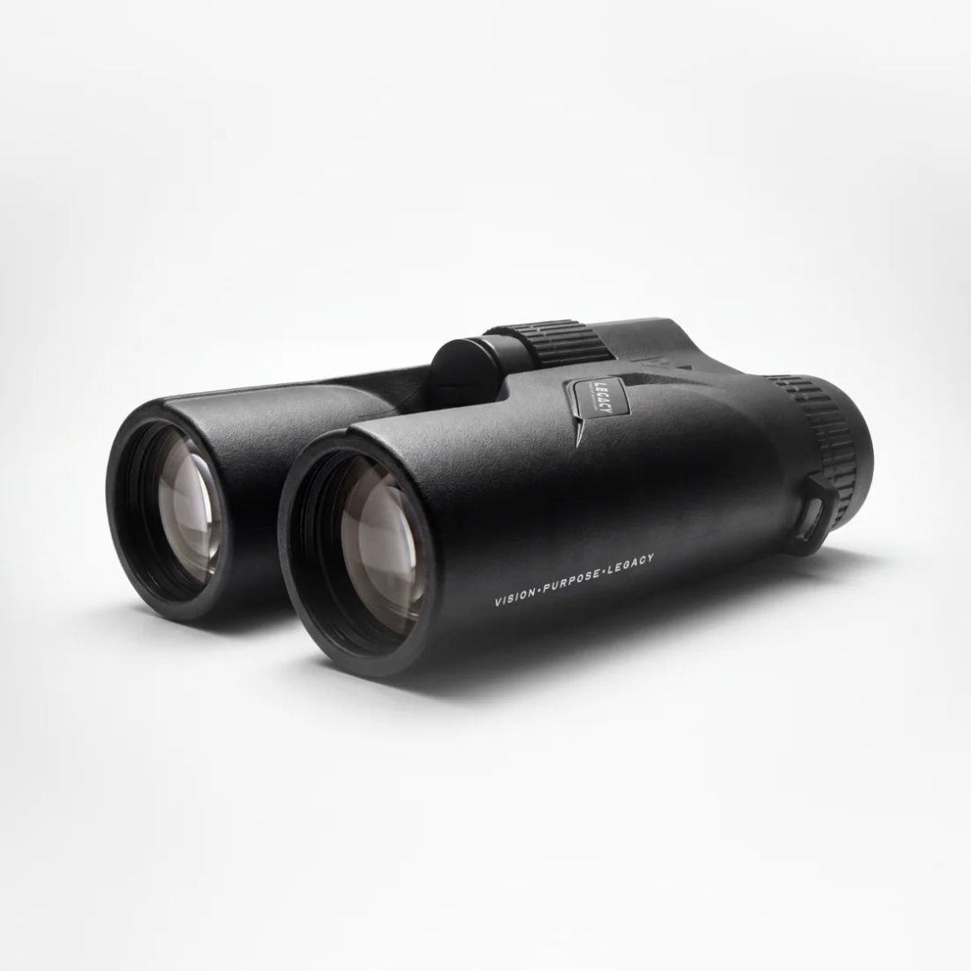 Side profile of the AKRA Legacy 10x42 rangefinding binoculars featuring the focus wheel.