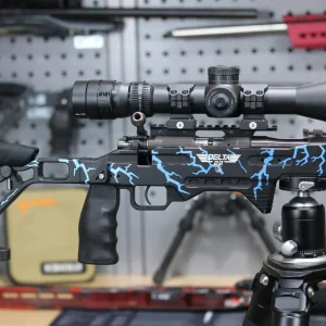 Full side profile of the Delta .22 precision rimfire chassis in custom black and blue lightning camo mounted on a tripod.