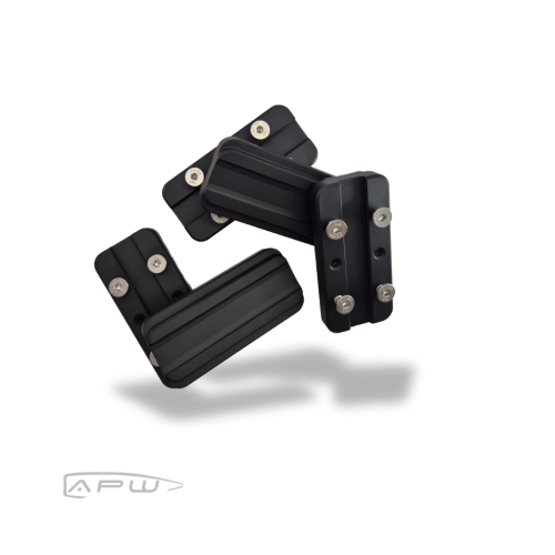 Five black steel internal forend weights for MDT ACC chassis displaying clearance slots and mounting screws on a white background